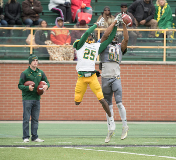 Football players jumping